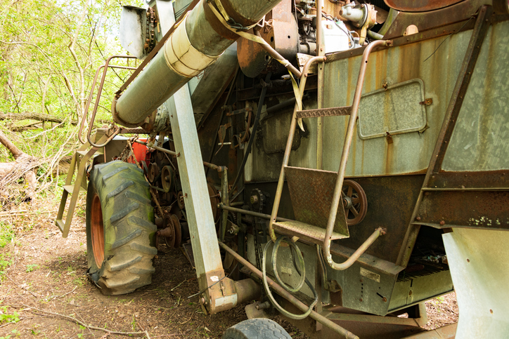 Closeup of a vintage gleaner and its agricultural equipment components